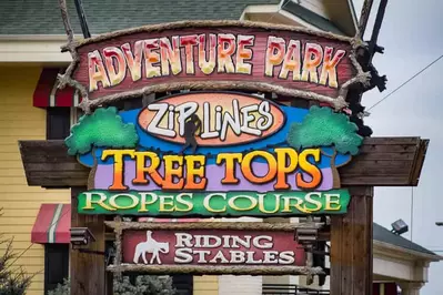 adventure park five oaks sign