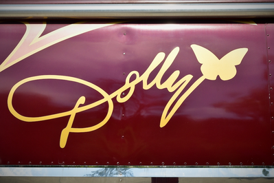 Dolly signature with butterfly